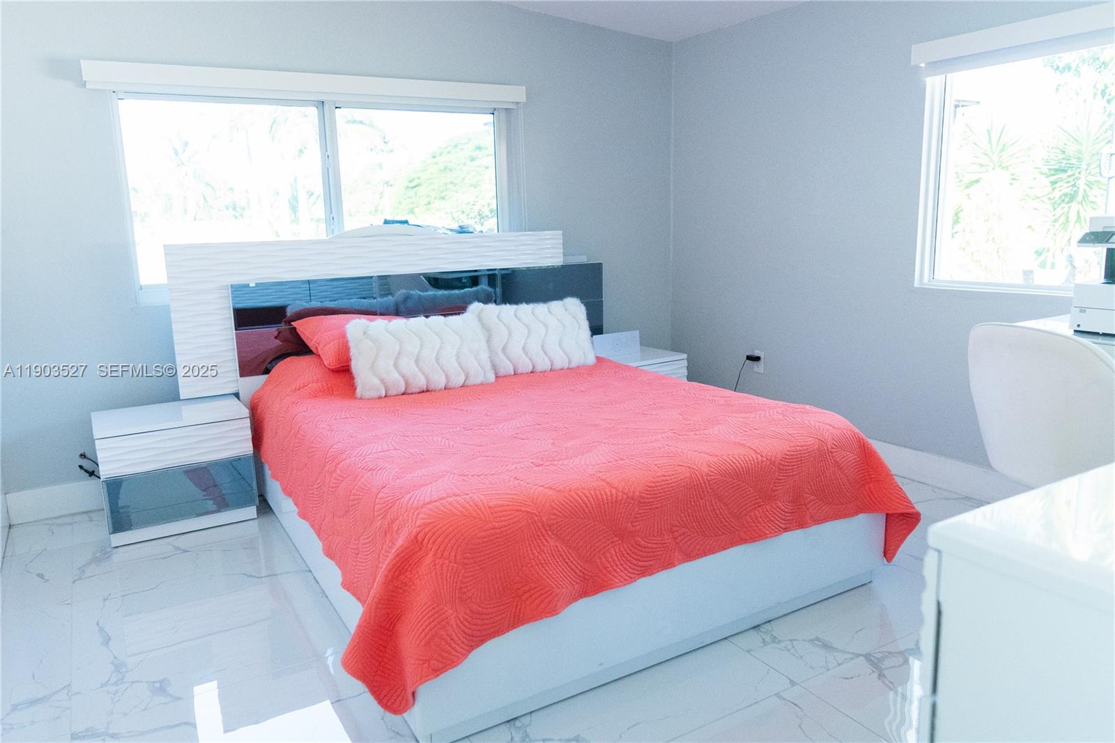 19245 Southwest 188th Street Miami, FL 33187 - Photo 26 of 38 a bed room with a bed and a window