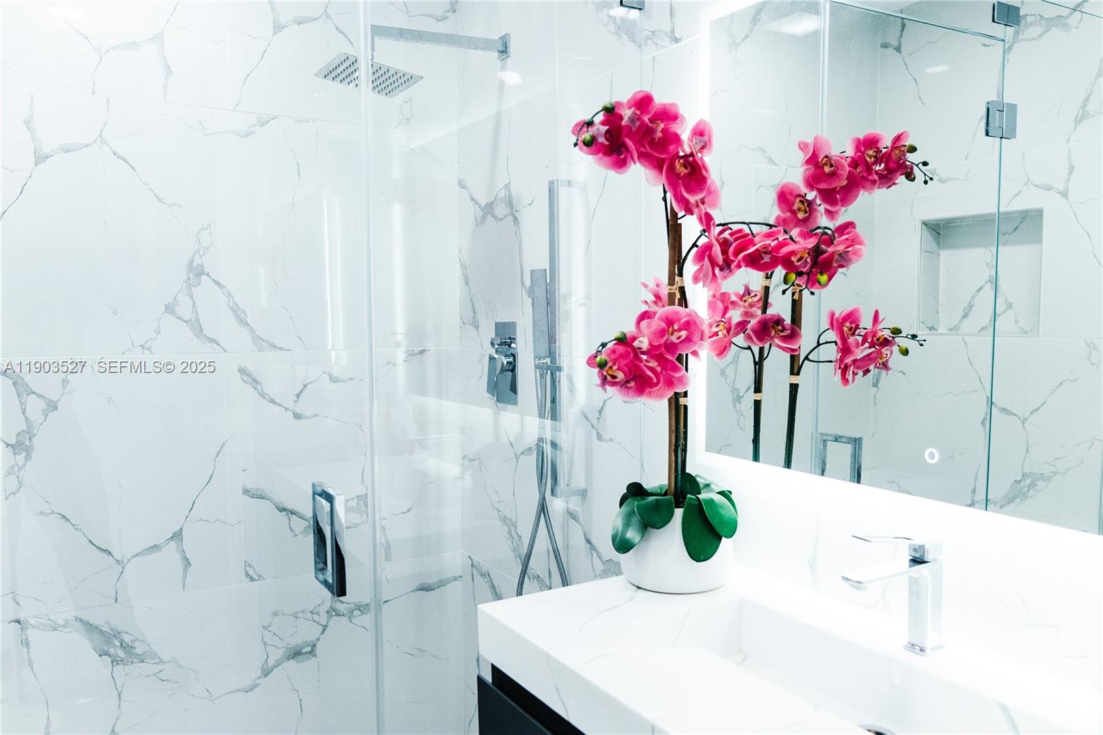 19245 Southwest 188th Street Miami, FL 33187 - Photo 29 of 38 a vase of flowers sitting on a table