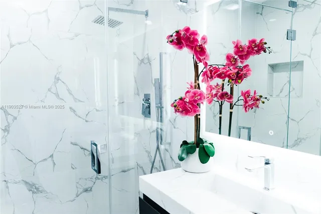 a vase of flowers sitting on a table