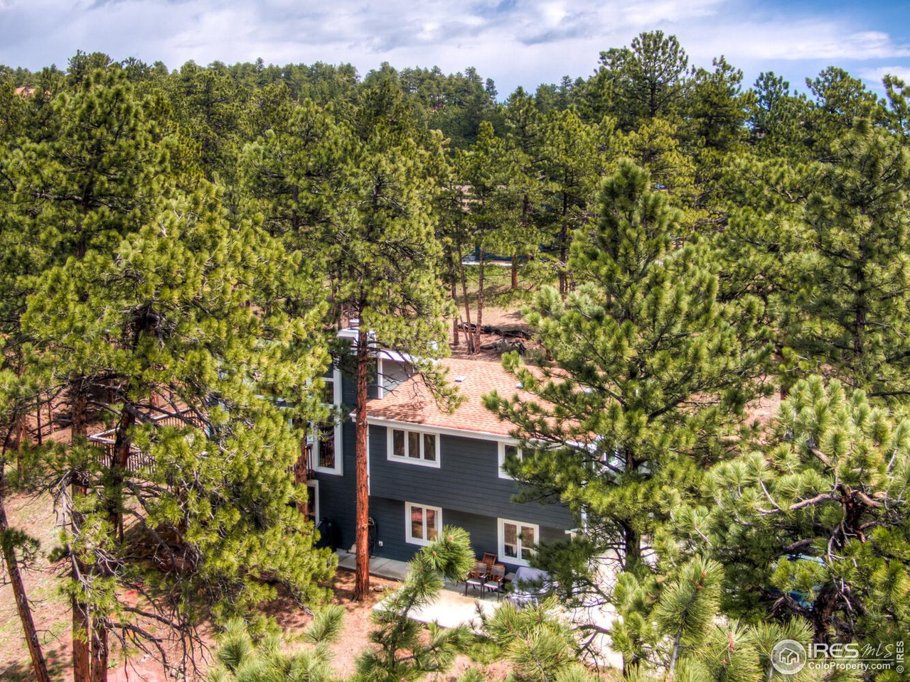 215 Broken Fence Road Boulder, CO 80302 - Photo 30 of 40 an aerial view of a house with a yard