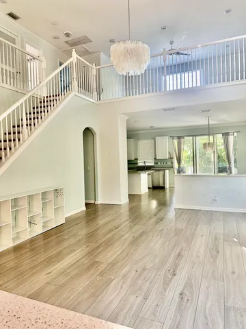 a view of sitting area in front of a house