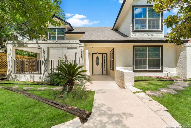 a house view with a garden space