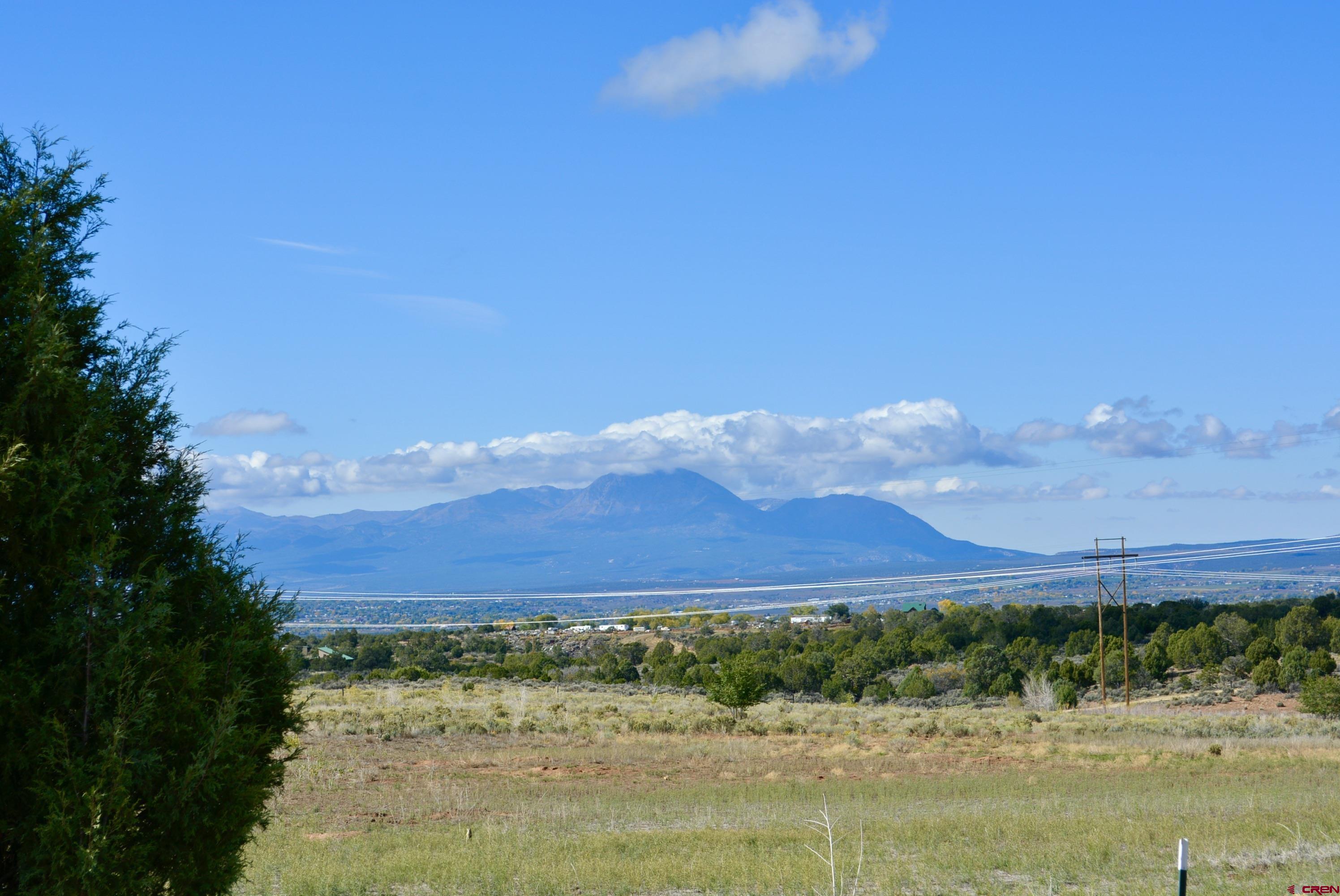 14421 32.1 Road Mancos, CO 81328 - Photo 30 of 30 a view of a lake with sunset