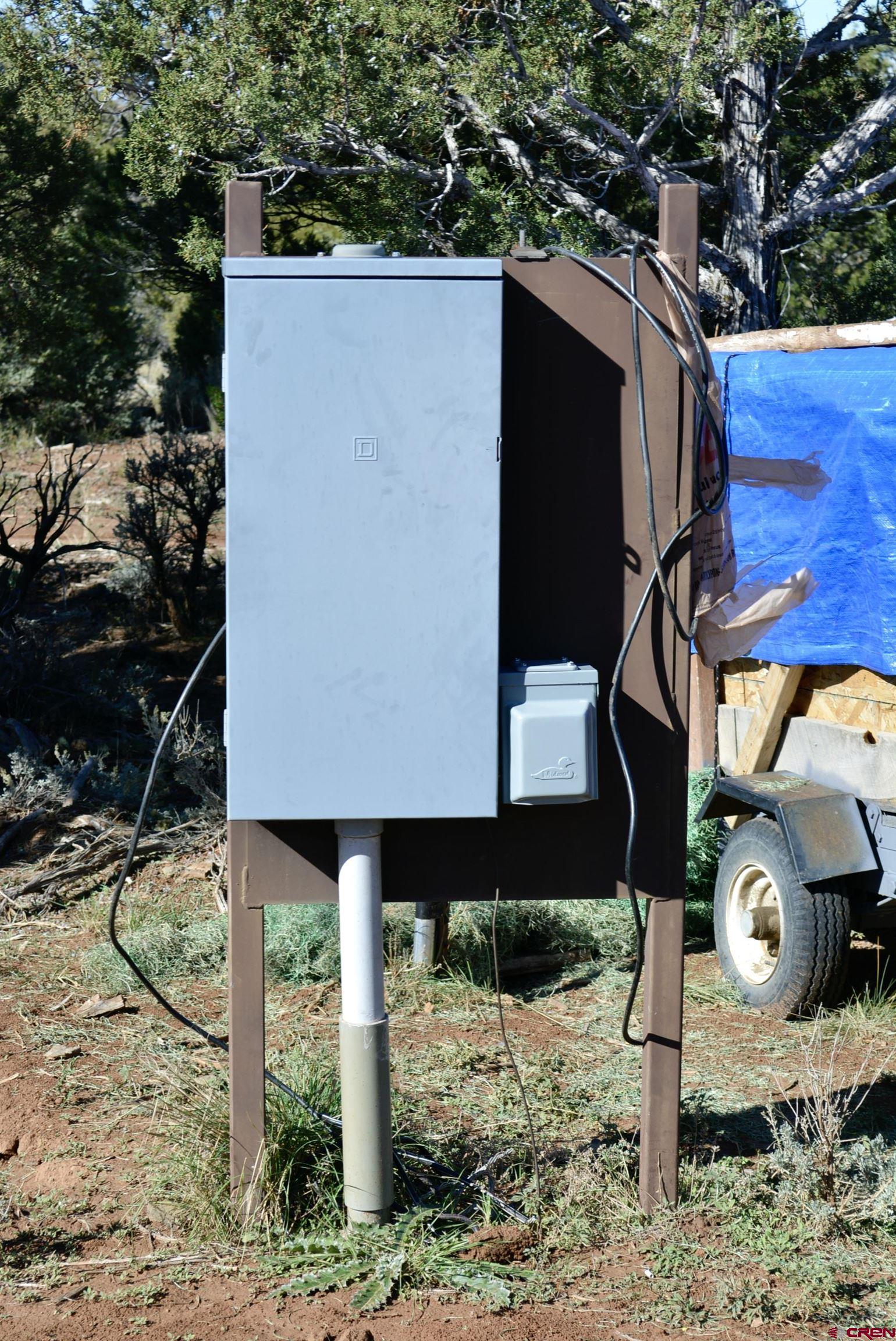 14421 32.1 Road Mancos, CO 81328 - Photo 7 of 30 a view of a house with a yard