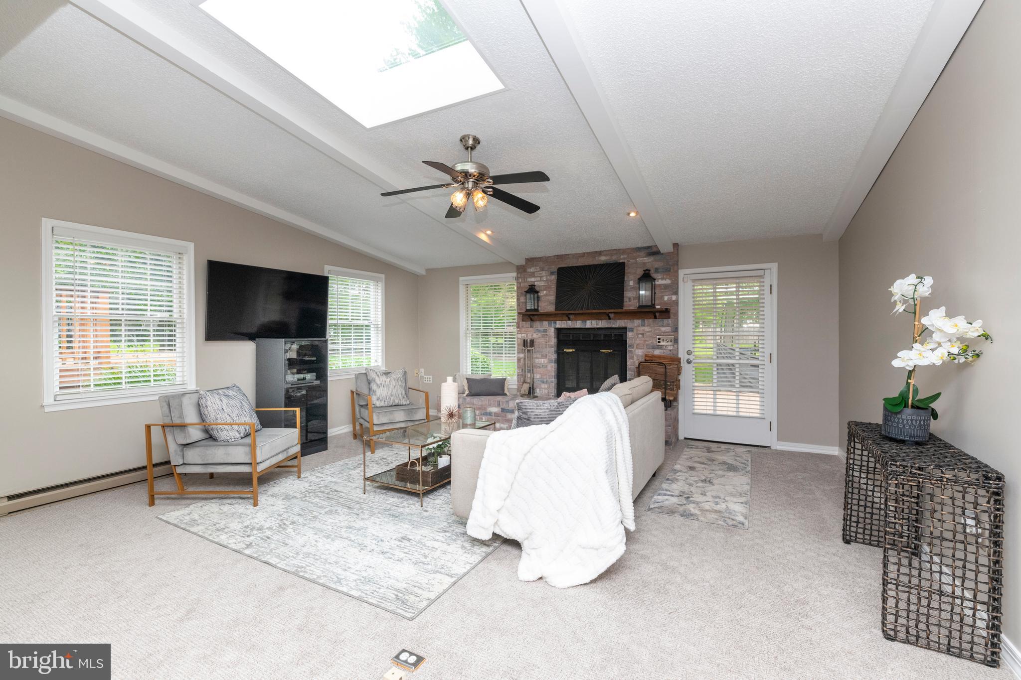 8403 Ellison Road Lutherville-Timonium, MD 21093 - Photo 1 of 52 Family Room has all brick woodburning fireplace