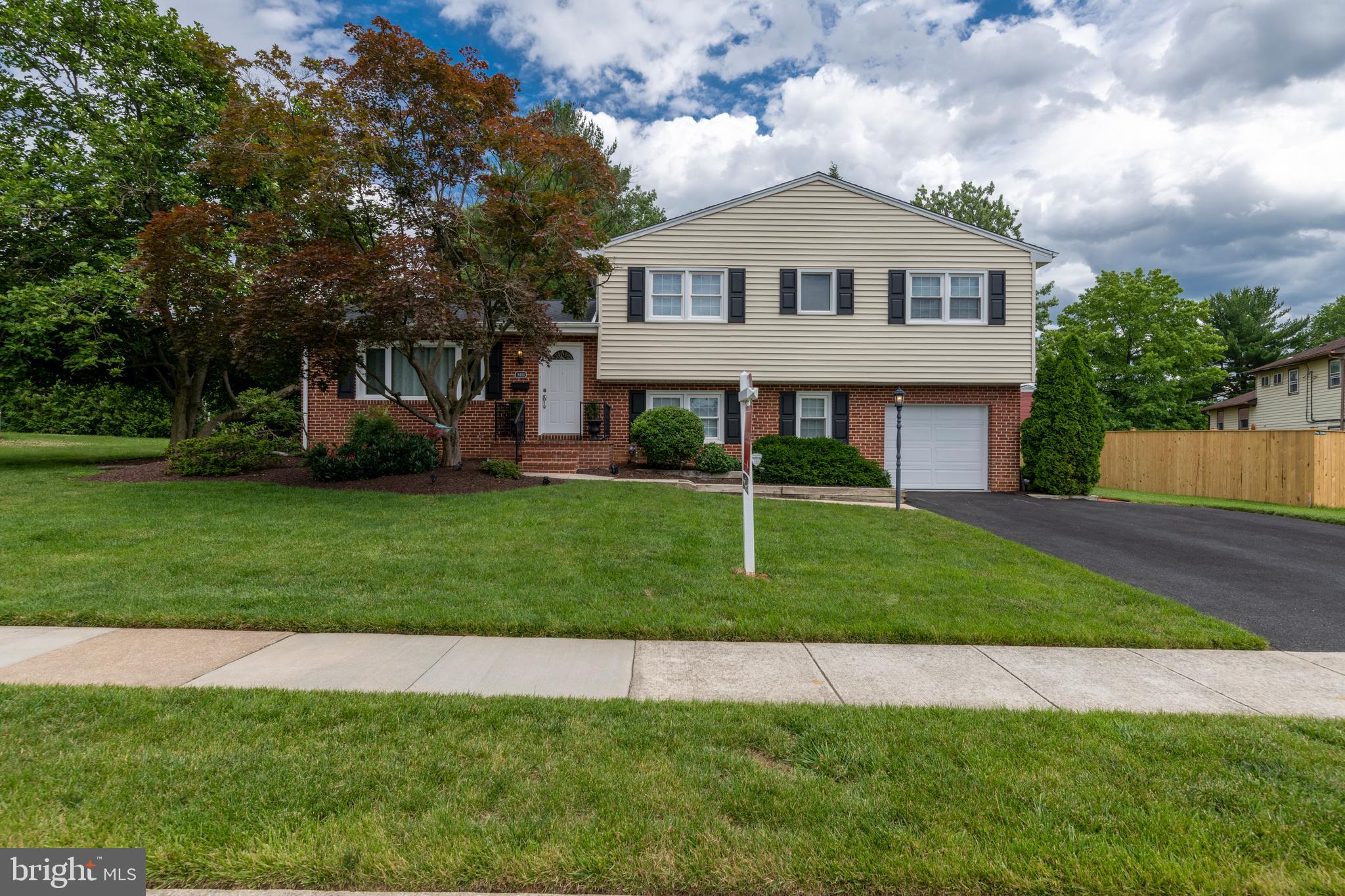 8403 Ellison Road Lutherville-Timonium, MD 21093 - Photo 4 of 52 Sidewalks and oversized driveway with a garage!