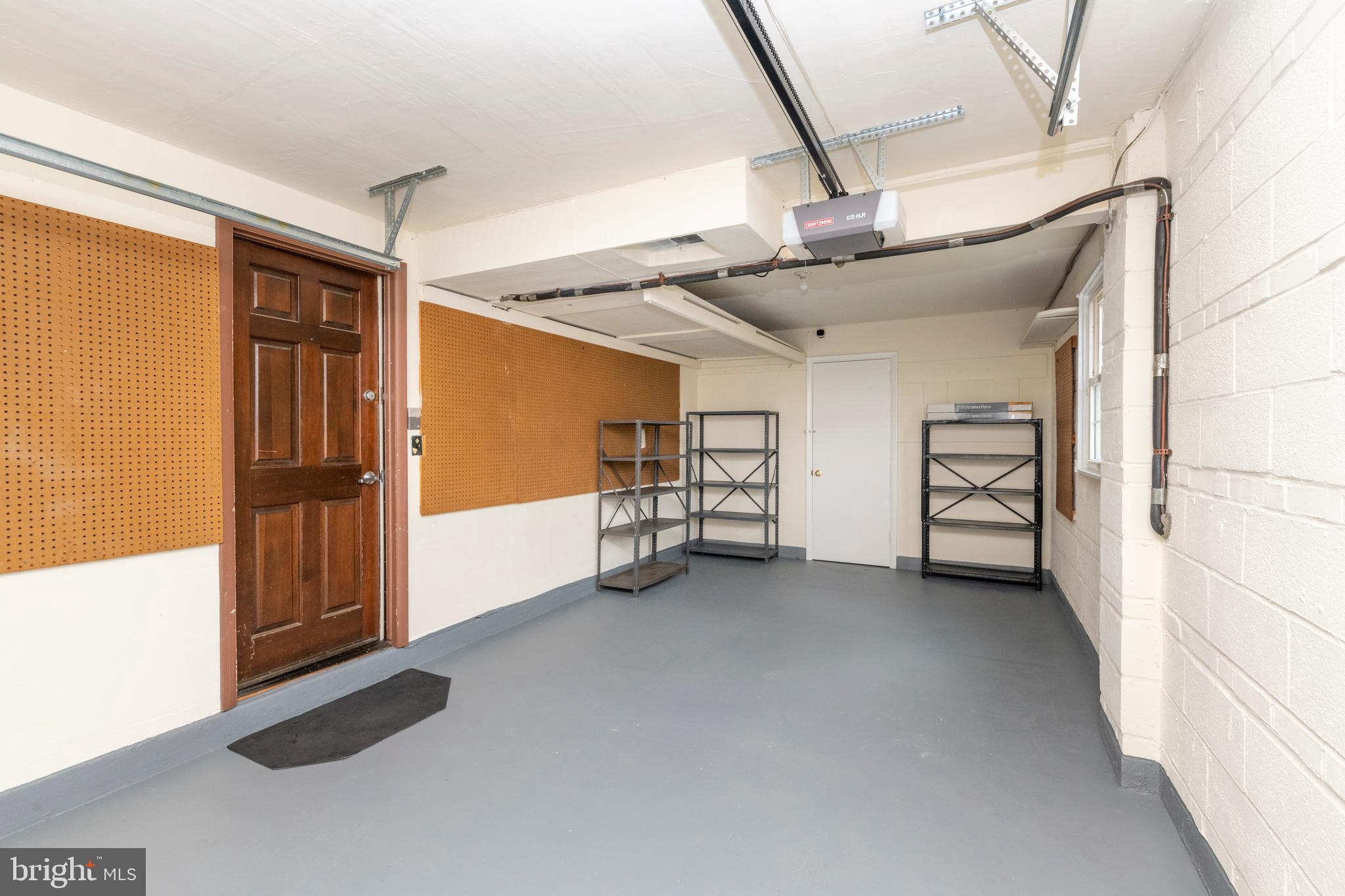 8403 Ellison Road Lutherville-Timonium, MD 21093 - Photo 42 of 52 One Car Garage has storage in the back thru door!