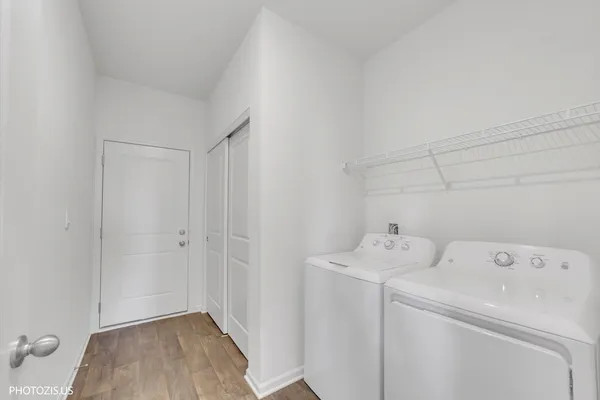 a view of utility room with washer and dryer