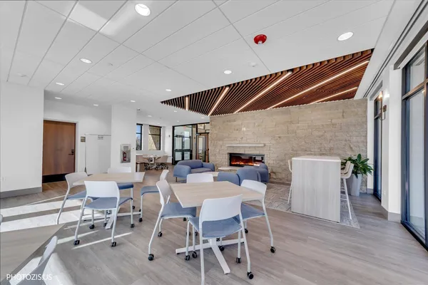 a very nice looking dining room with a table and chairs