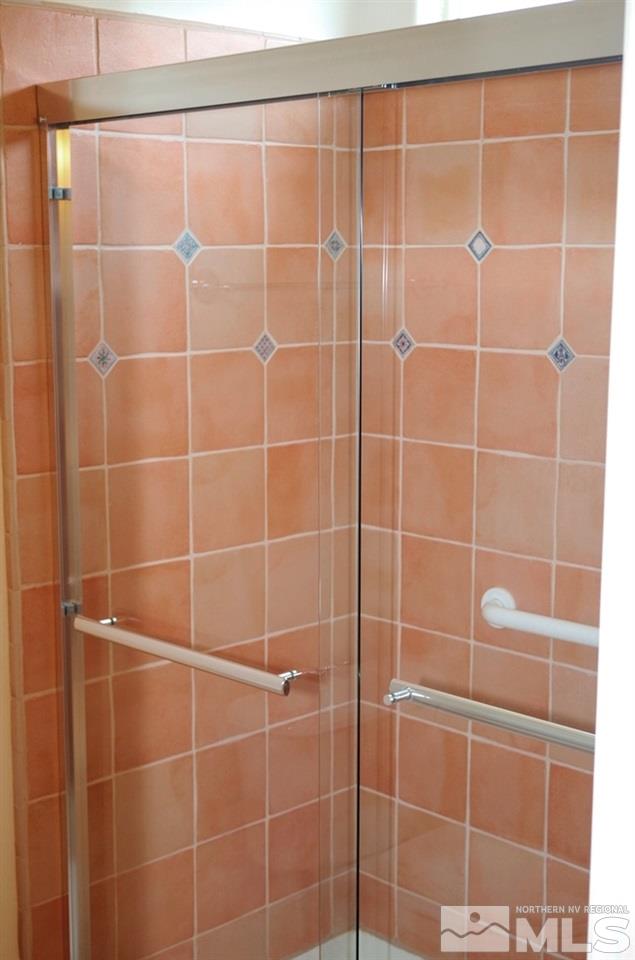 3327 Skyline Boulevard Reno, NV 89509 - Photo 14 of 17 a bathroom with a shower