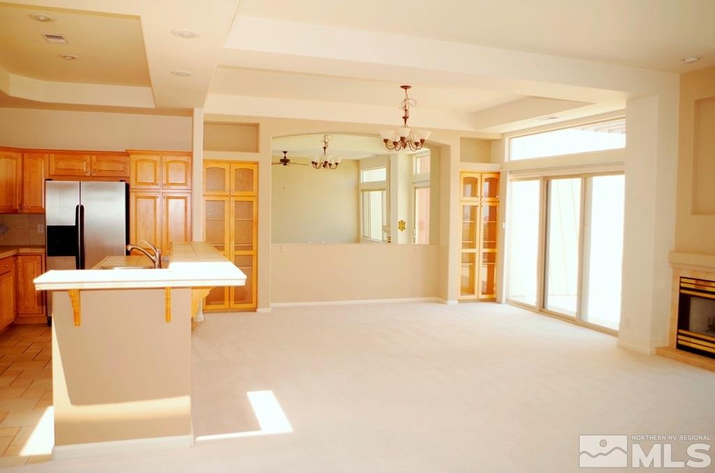 3327 Skyline Boulevard Reno, NV 89509 - Photo 10 of 17 a view of a bathroom with a tub sink and mirror