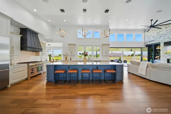 a kitchen with stainless steel appliances lots of counter top space