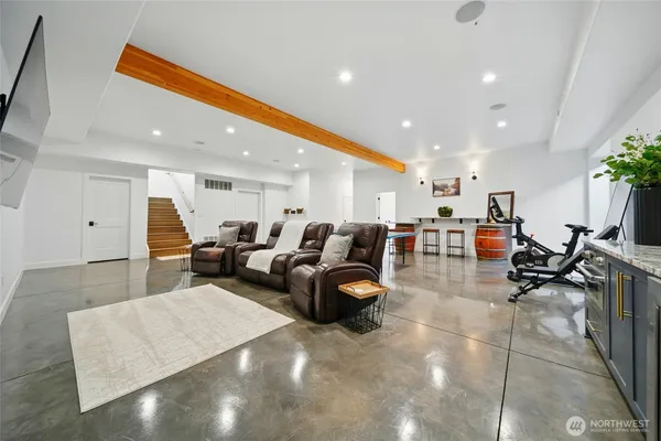 a living room with lots of furniture and a view of couch