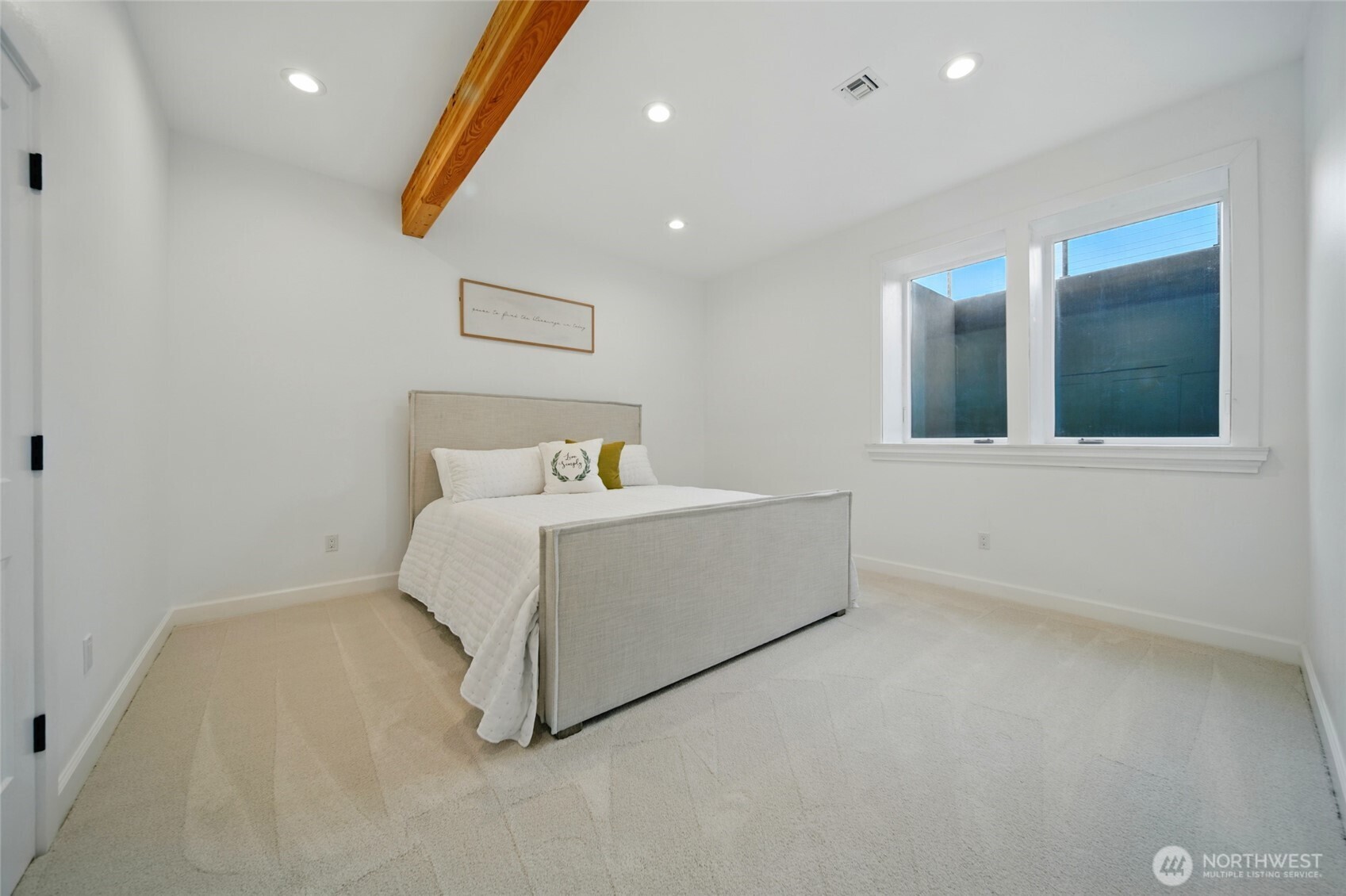 126 Red Hawk Road Walla Walla, WA 99362 - Photo 36 of 40 a white bed sitting in a room next to a window