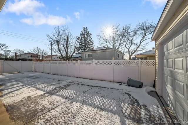 a view of a backyard of the house