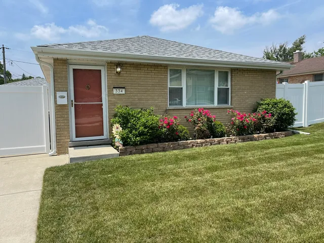 a front view of house with yard