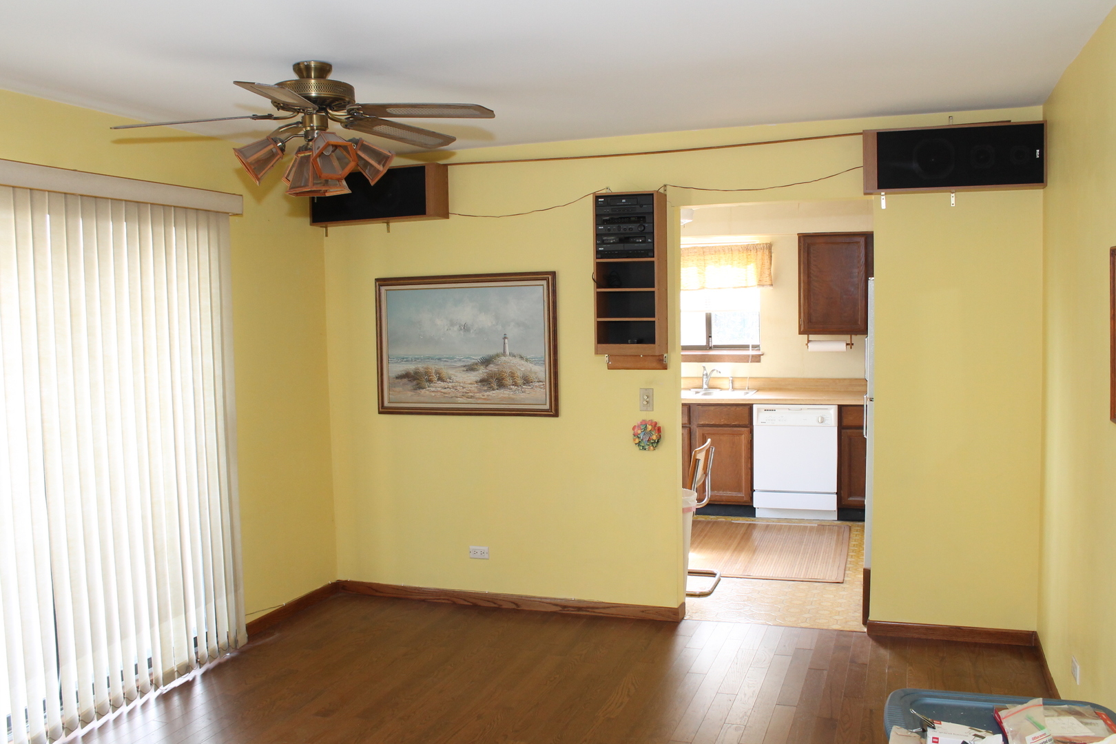 69 White Oaks Road, Unit 69 Fox Lake, IL 60020 - Photo 5 of 16 a view of a hallway with wooden floor and a cabinet