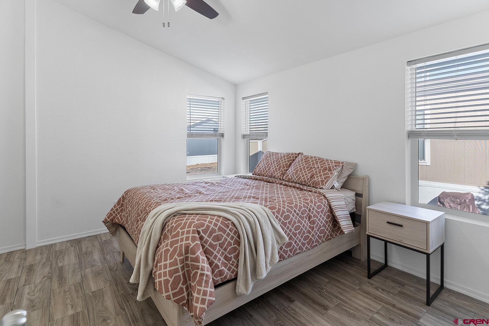 901 6530 Road, Unit 2836 Montrose, CO 81401 - Photo 10 of 21 a bedroom with a bed and a window