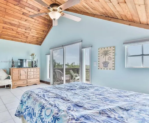 a view of a lake with a tree