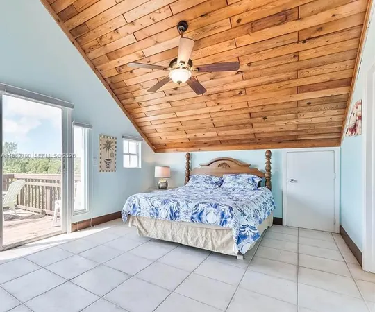 a view of balcony with furniture and wooden deck