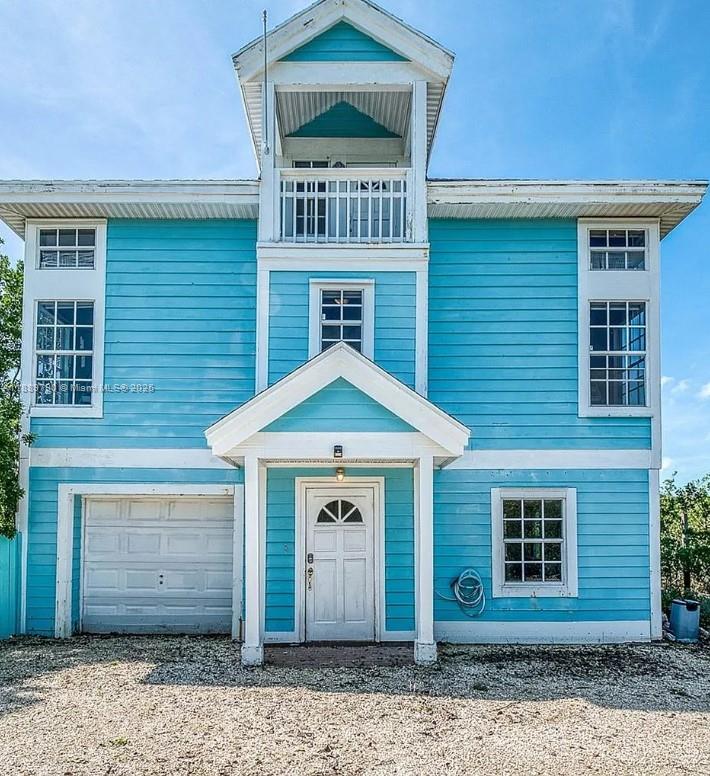 202 West Canal Drive Key Largo, FL 33037 - Photo 29 of 29 a front view of a house with a yard