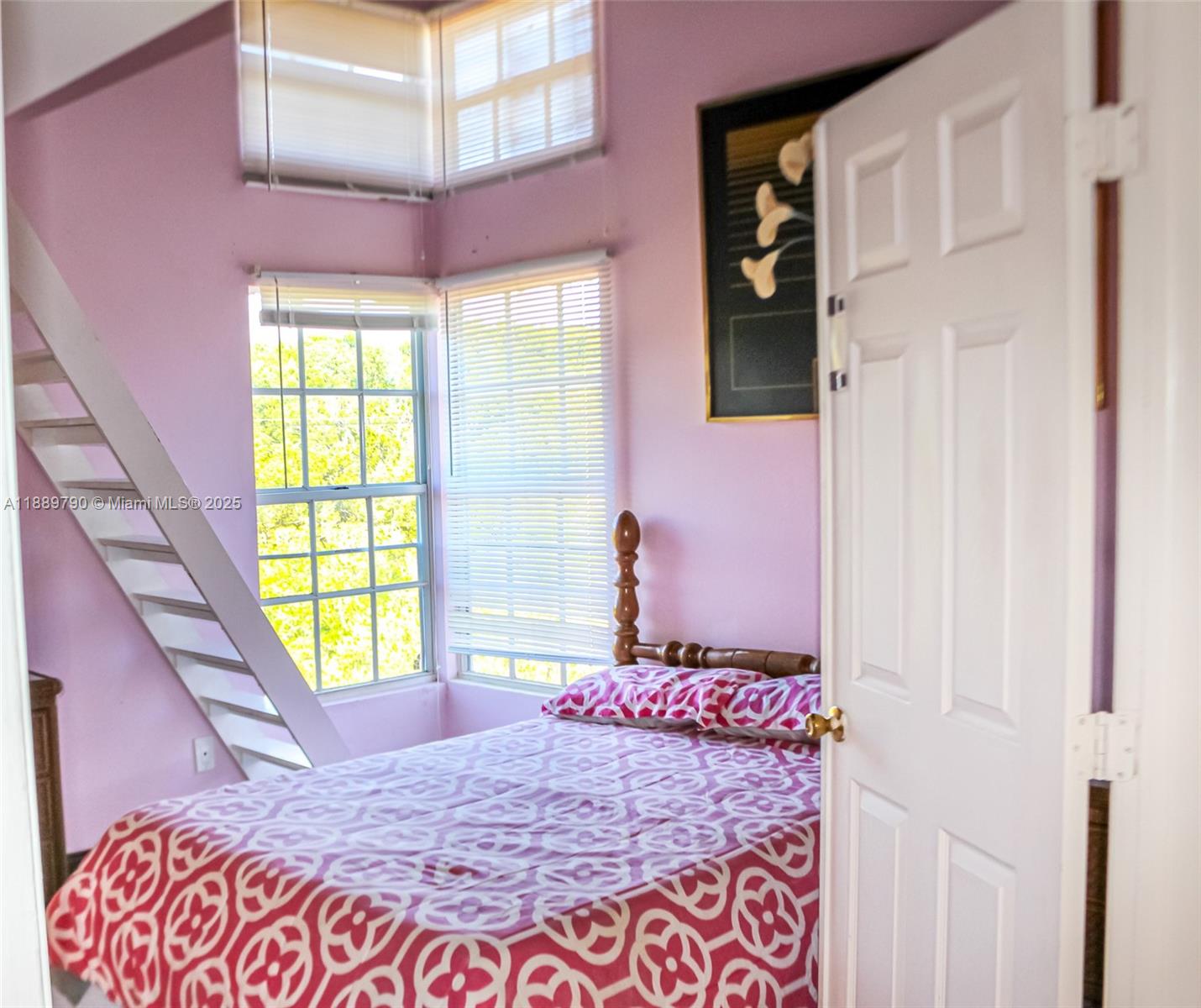 202 West Canal Drive Key Largo, FL 33037 - Photo 7 of 29 a bedroom with a bed and a window