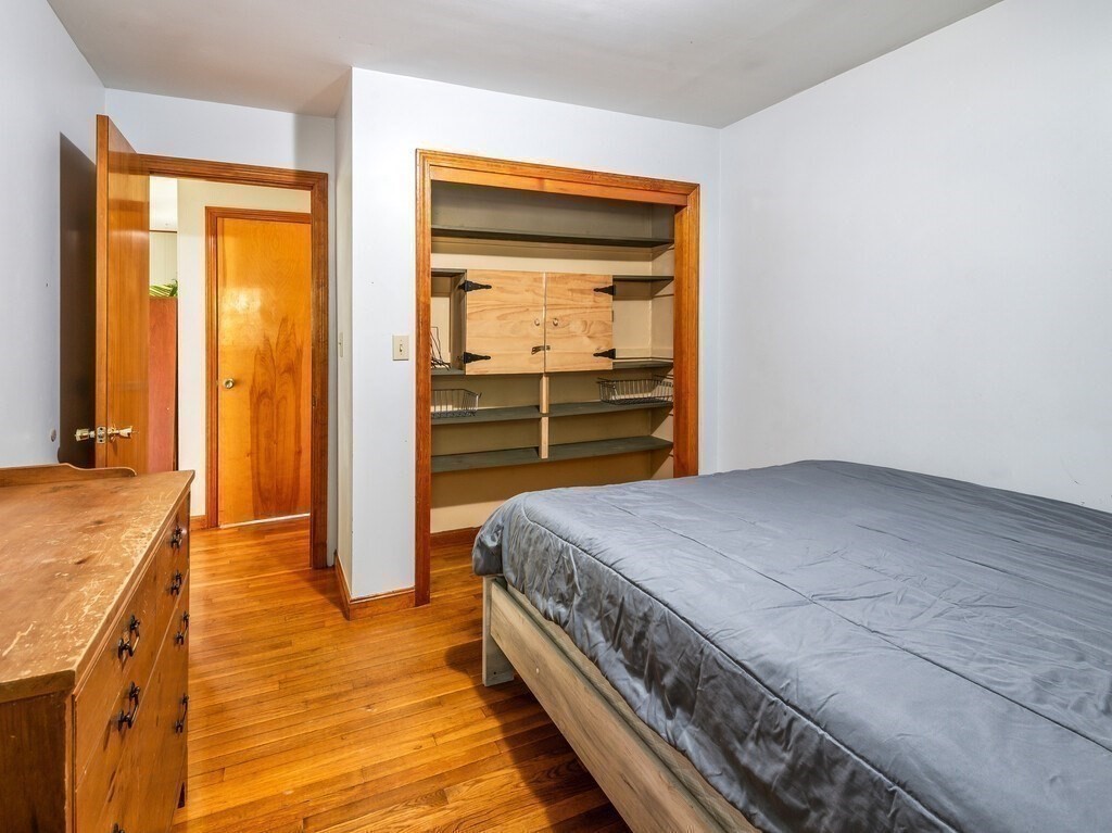 30 Russell Hill Road Ashburnham, MA 01430 - Photo 26 of 41 a bedroom with a bed and a dresser