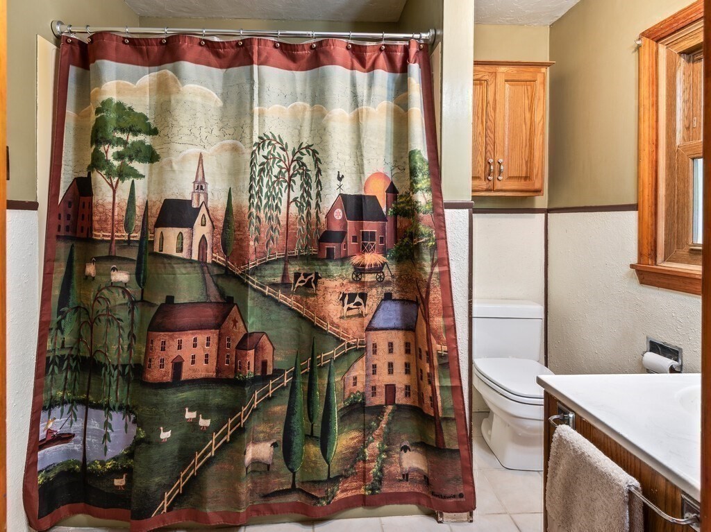 30 Russell Hill Road Ashburnham, MA 01430 - Photo 29 of 41 a room that has a bed and a table in it