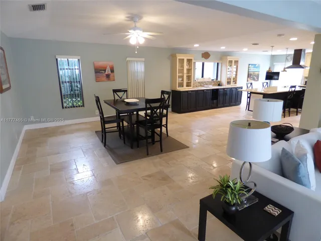 a view of a dining room with furniture