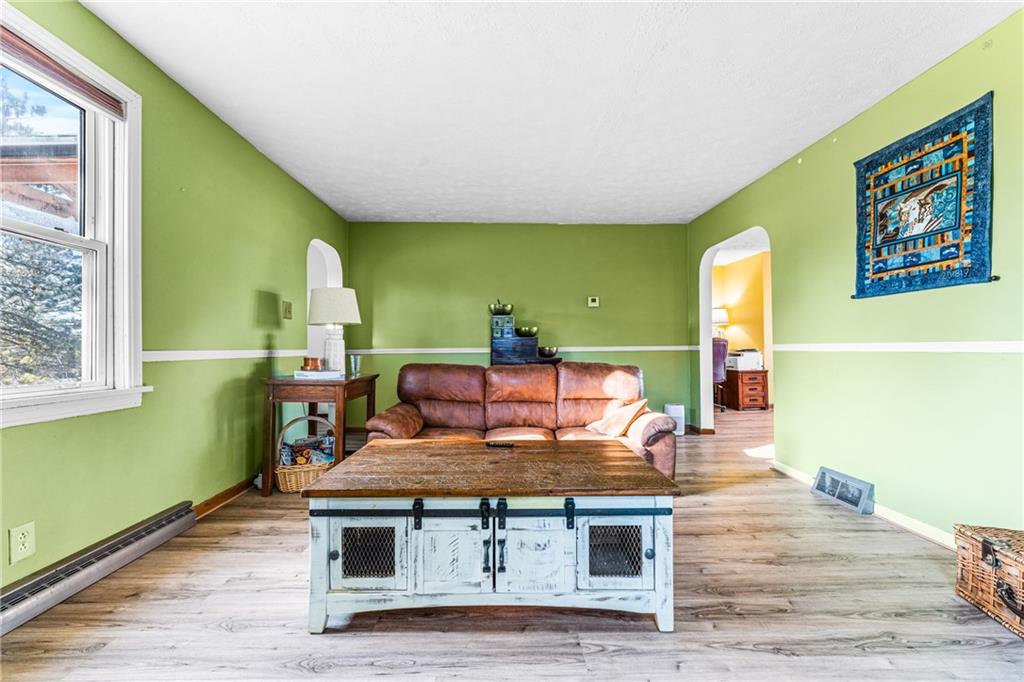 259 Line Road Mercer, PA 16137 - Photo 16 of 33 a living room with furniture and a wooden floor