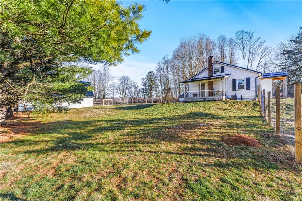 259 Line Road Mercer, PA 16137 - Photo 28 of 33 a view of a house with a big yard and large trees