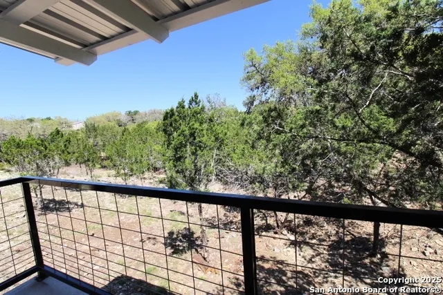 a view of a house with a street
