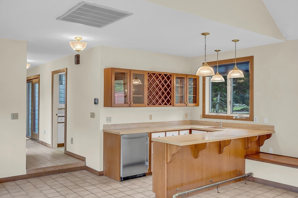65 Bailey Road Andover, MA 01810 - Photo 23 of 42 a view of kitchen with granite countertop cabinets and window