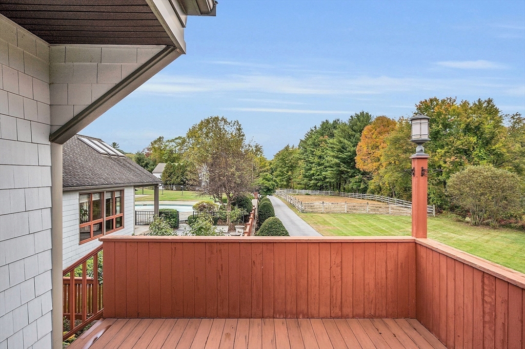 65 Bailey Road Andover, MA 01810 - Photo 38 of 42 a view of balcony with wooden floor and fence