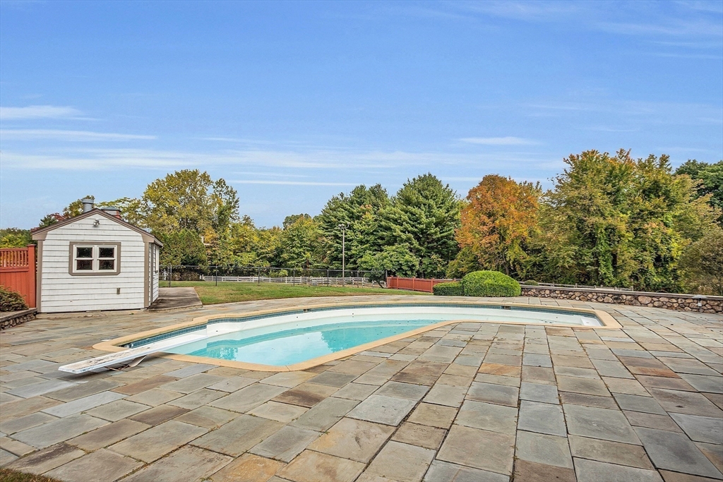 65 Bailey Road Andover, MA 01810 - Photo 41 of 42 a view of a house with a yard and a large area
