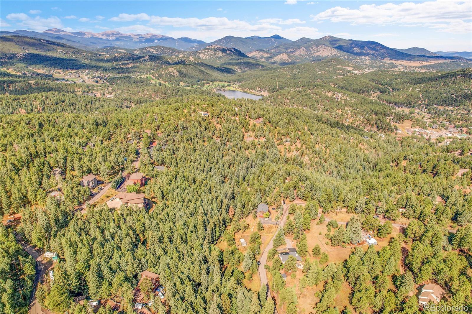 Mountain Park Road Evergreen, CO 80439 - Photo 46 of 50 a view of an aerial view of residential houses with a lake view