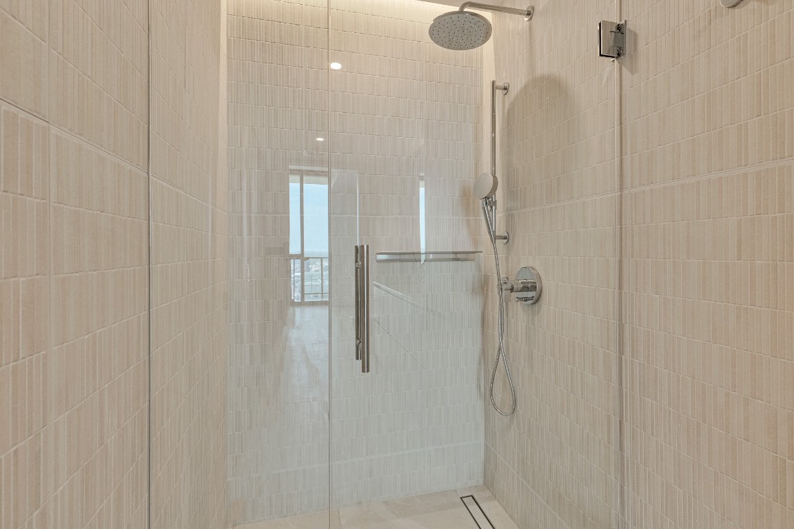 610 Davis Street, Unit 4406 Austin, TX 78701 - Photo 16 of 36 a bathroom with a shower