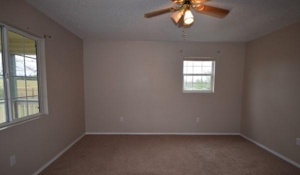 1508 McCauley Road Baker, FL 32531 - Photo 7 of 12 an empty room with a window