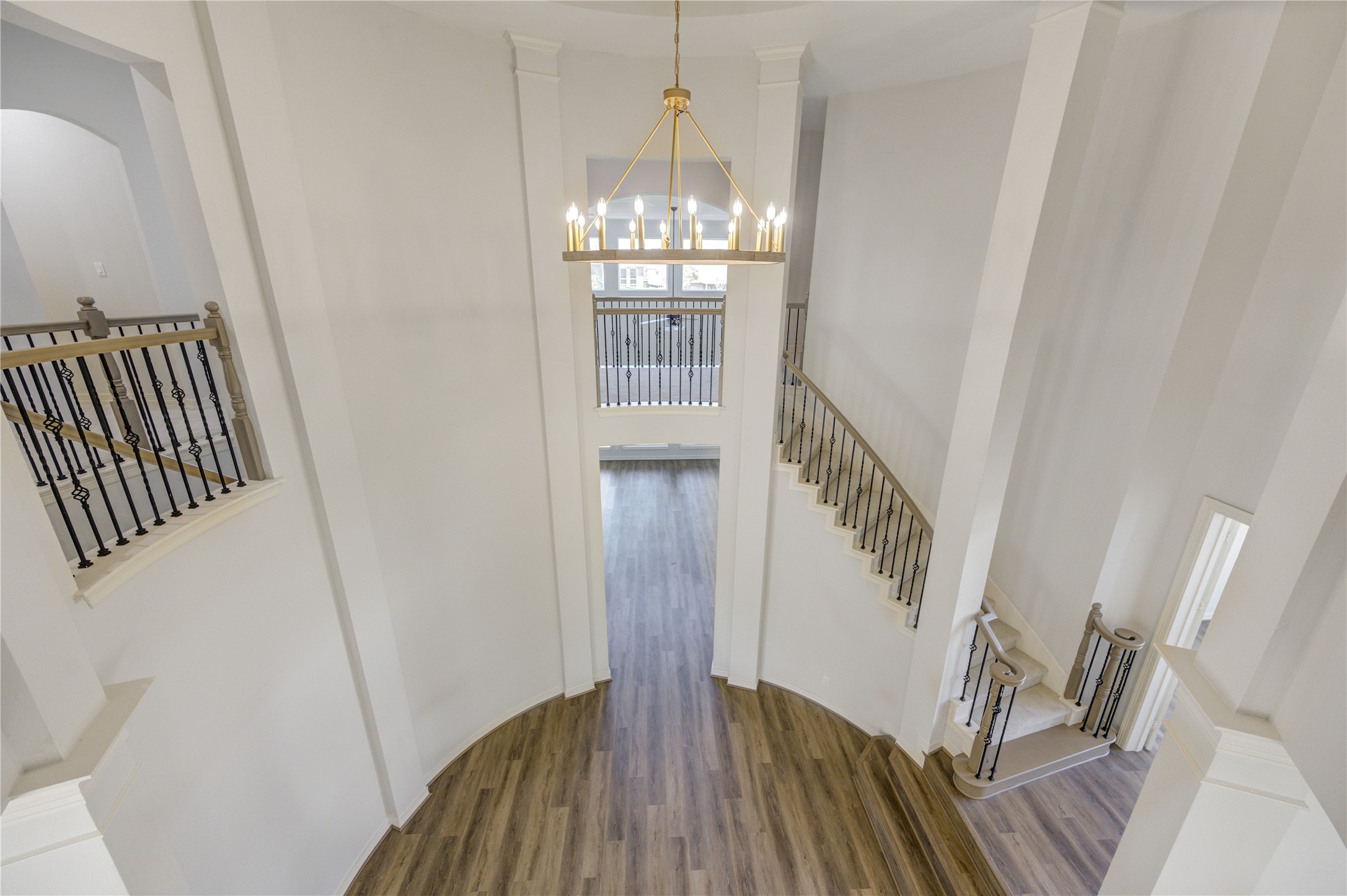 3007 Mullingar Walk Missouri City, TX 77459 - Photo 39 of 49 a view of a hallway view with wooden floor and staircase