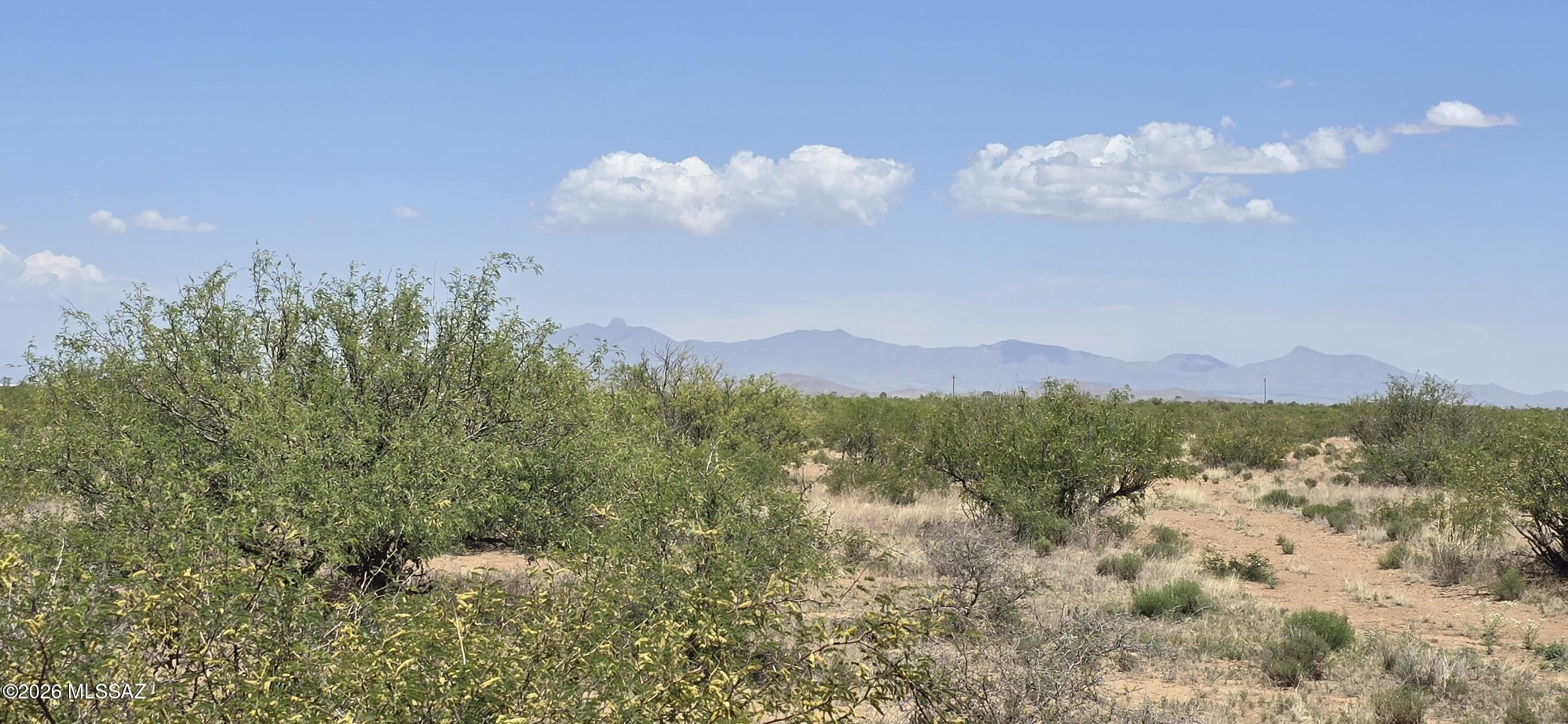 Tbd 8-ac East Aschenbach Road, Unit 319D Pearce, AZ 85625 - Photo 1 of 8 a view of a city with mountains in the background