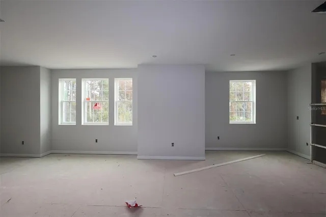 an empty room with a window