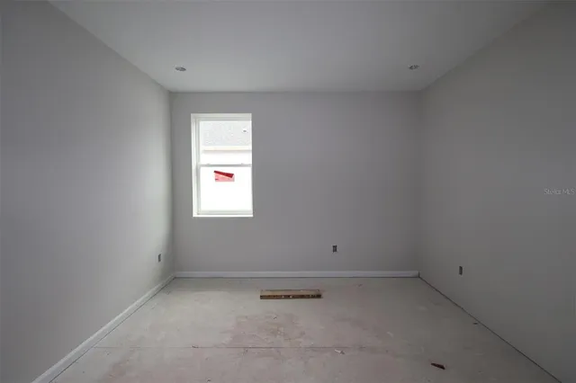 an empty room with a window