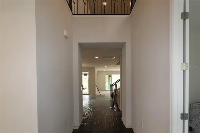 a view of a livingroom from a hallway