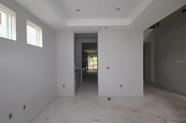 a view of an empty room and window