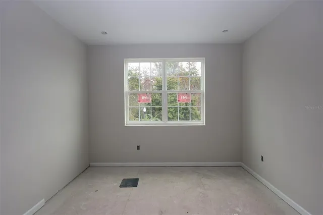 an empty room with a window