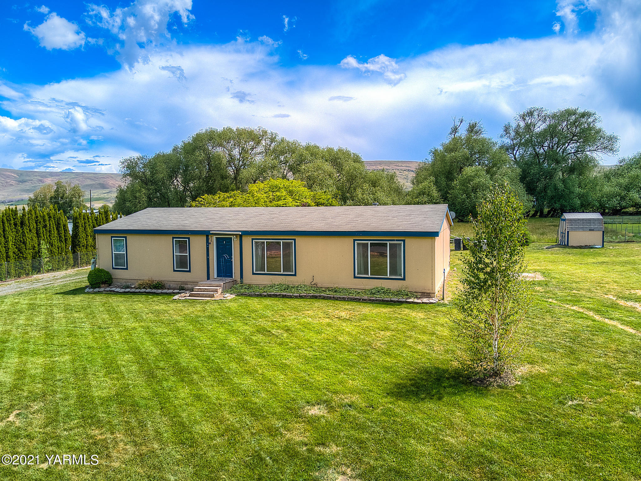10204 Meadowbrook Road Yakima, WA 98903 - Photo 20 of 29 a view of a house with a yard