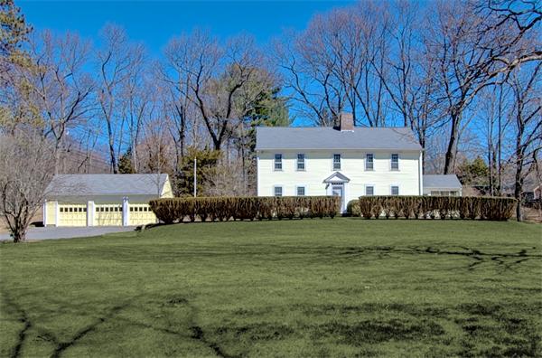 110 Belknap Road Framingham, MA 01701 - Photo 1 of 30 a front view of a house with a garden
