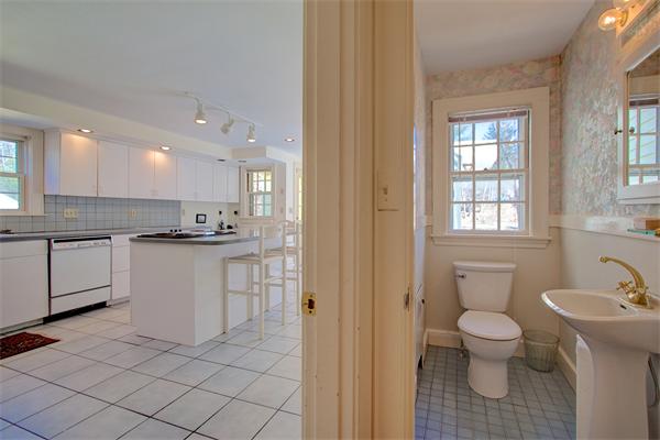 110 Belknap Road Framingham, MA 01701 - Photo 11 of 30 a bathroom with a toilet sink and a mirror