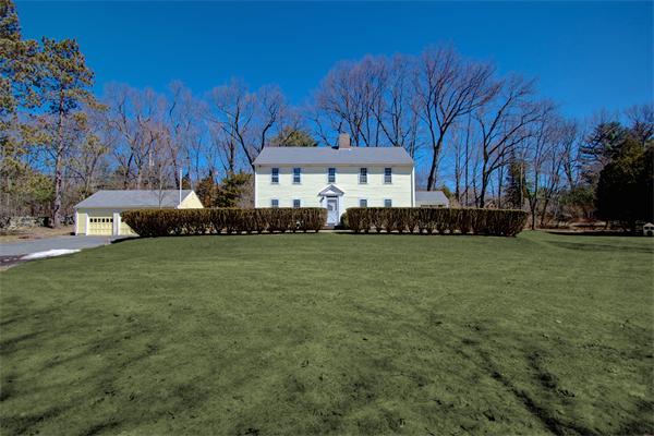 110 Belknap Road Framingham, MA 01701 - Photo 2 of 30 a front view of a house with a garden