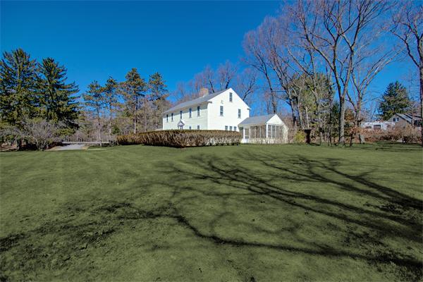 110 Belknap Road Framingham, MA 01701 - Photo 27 of 30 a view of a big house with a big yard and large tree